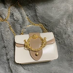 Tan and cream mini crossbody messenger bag